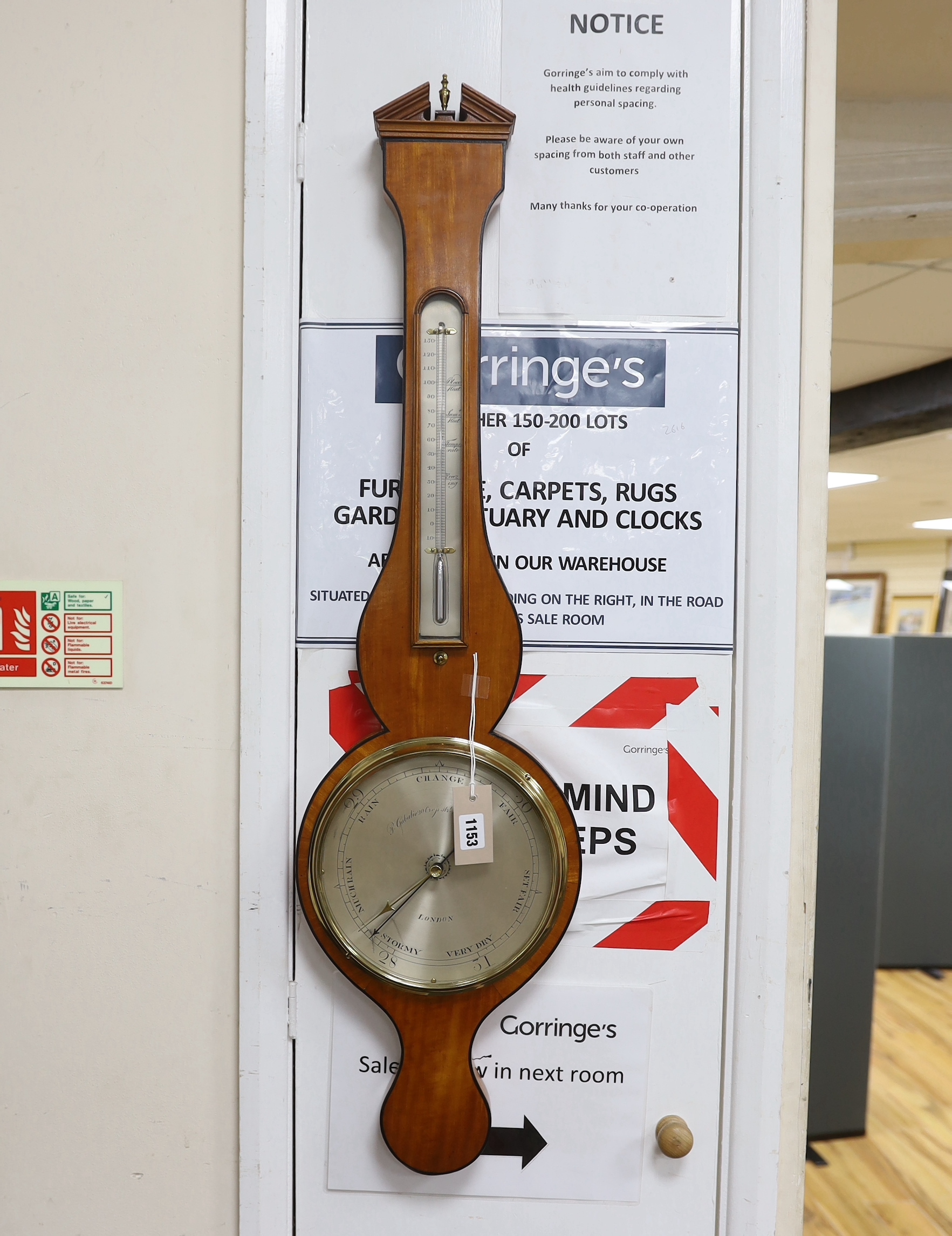 An early 19th century satinwood wheel barometer, height 100cm